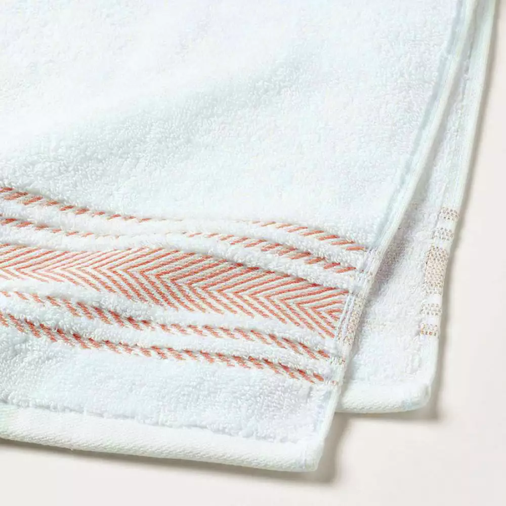 Toalla de mano 550 GSM blanca con borde fire whirl 40cmx70cm